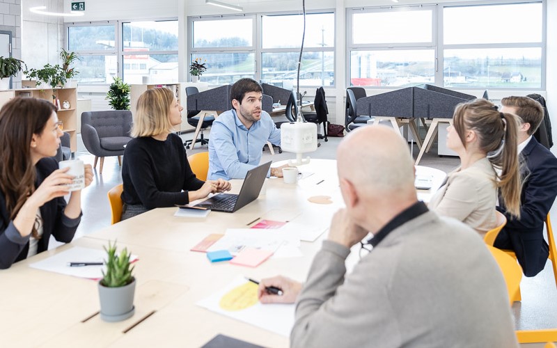 Business people at the Switzerland Innovation Park Basel Area site Jura