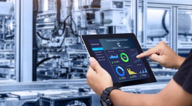 man on tablet working